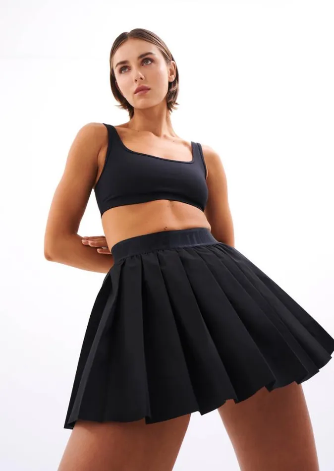Shop VOLLEY SKIRT IN BLACK PE Nation Skirts