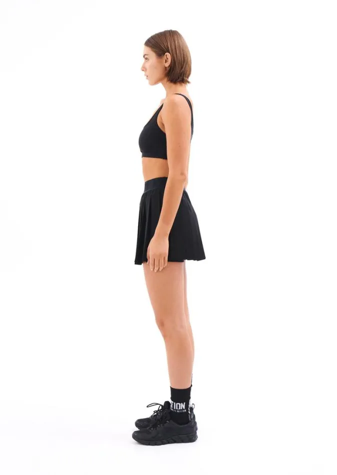 Shop VOLLEY SKIRT IN BLACK PE Nation Skirts